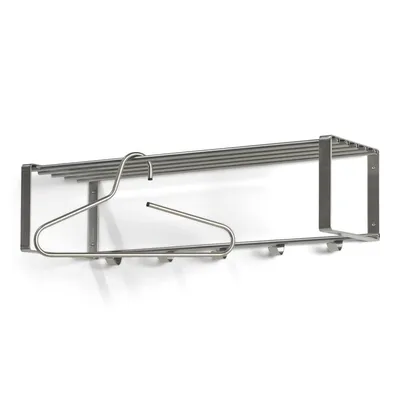 A metal coat rack with a shelf and several hooks is mounted on a white wall. A single metal hanger is placed on the coat rack.