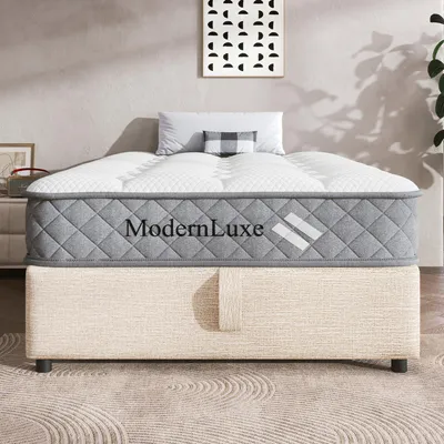A mattress on a bed base in a room setting.