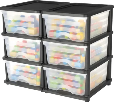 A set of two stackable plastic drawer units filled with colorful building blocks.