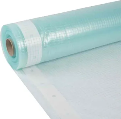 A roll of light blue protective sheeting with a white grid pattern is shown, partially unrolled.