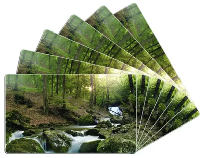 Produktbild von Wallario Frühstücksbrettchen 6er Set aus Glas, je 14 x 23 cm, mit rutschfesten Füßen, Motiv Fließender Bach im Wald bei Sonnenuntergang
