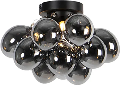 A close-up studio shot of a black ceiling light fixture with multiple smoked glass globes.