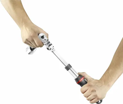 Two hands are holding and demonstrating a telescopic ratchet wrench with a flexible head.