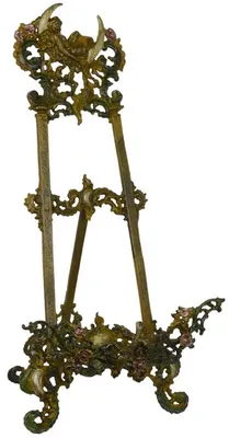 Immagine prodotto di Casa Padrino cavalletto liberty marrone antico effetto ruggine / multicolore h. 59 cm - Cavalletto in ghisa con supporto pieghevole