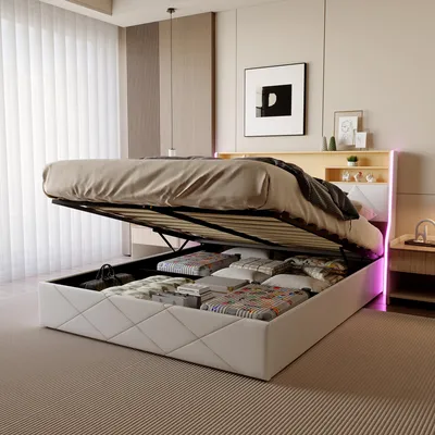 A modern bedroom with a bed that has its storage compartment open, revealing stored items. The bed features LED lighting.