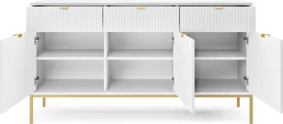 A white sideboard with gold legs and handles, with its doors and drawers open to reveal empty shelves.