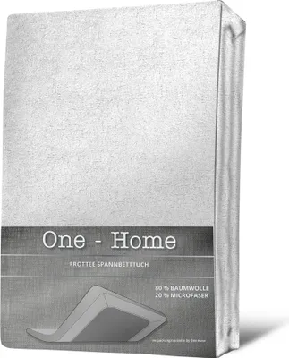 A product image of a white fitted sheet, presented in a clean, studio-like setting with branding and material information.