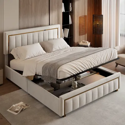 A bedroom scene featuring a bed with its storage compartment open, showcasing items inside.