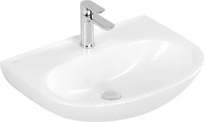 A white ceramic sink with a chrome faucet.