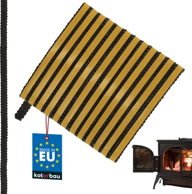 A square piece of black and yellow striped material with a tag attached, next to a wood-burning stove.