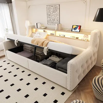 Immagine prodotto di Divano letto 90x200 cm in velluto beige, con vano contenitore a sollevamento idraulico, illuminazione LED, ripiano portaoggetti, presa di corrente, porte USB e di tipo C, e rete a doghe