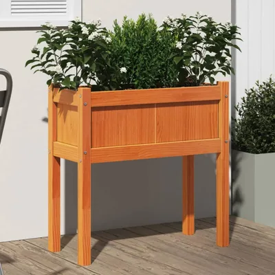 Image de Maison Exclusive - Bac à plantes avec pieds brun cire 70x31x70 cm Bois massif Pin