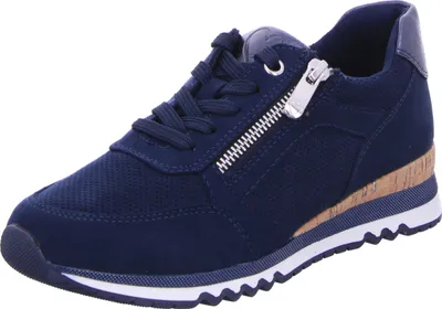 A single blue sneaker with a cork-like sole and a zipper detail.