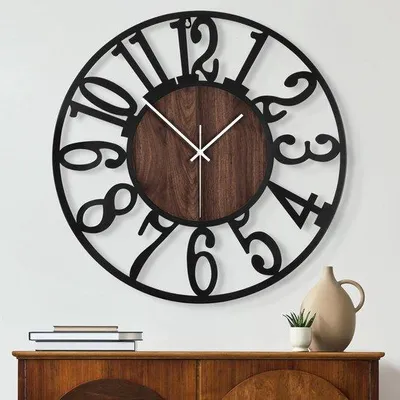 Immagine prodotto di Orologio in metallo e legno nero, alimentato a batteria, silenzioso