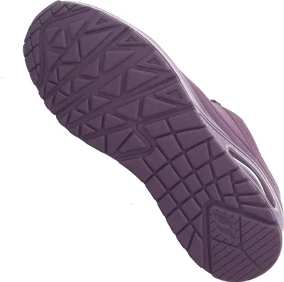 The sole of a purple sneaker is shown against a white background.