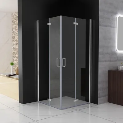 A modern bathroom with a glass shower enclosure.
