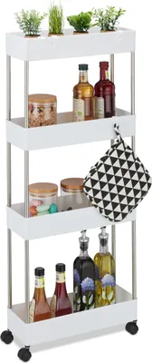 A white rolling cart with four shelves, stocked with various kitchen items and decorative plants.