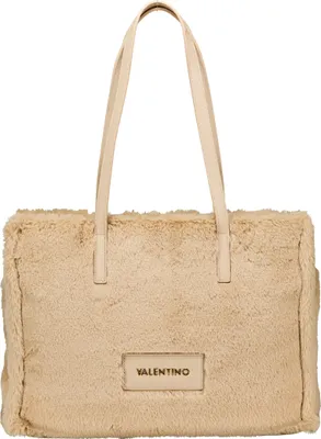 A beige faux fur tote bag with cream leather straps and a leather logo patch.