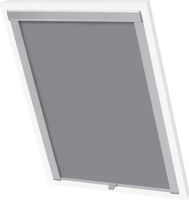 A close-up view of a gray roller blind installed in a slanted window frame.
