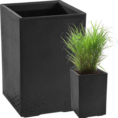 Two black planters, one large and one small with a plant, on a white background.