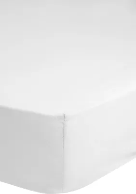 A close-up view of a white fitted sheet.