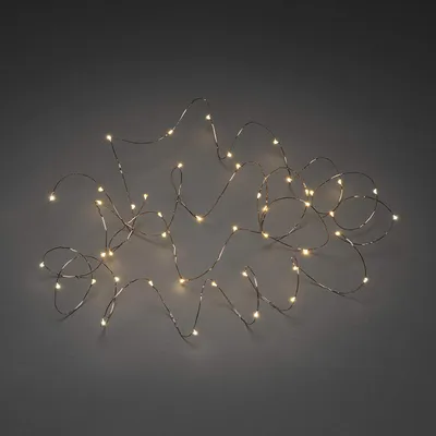Produktbild von Konstsmide 6387-860 LED Tropfenlichterkette , 100 bernsteinfarbene Dioden, 3V_Innentrafo, kupferfarbener Draht