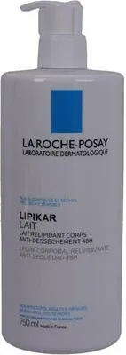 A white pump bottle of La Roche-Posay Lipikar Lait body lotion.
