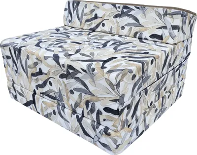 A folded mattress or futon with a leaf-like pattern.