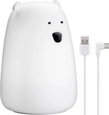 A white LED night light shaped like a polar bear, with two white charging cables next to it.