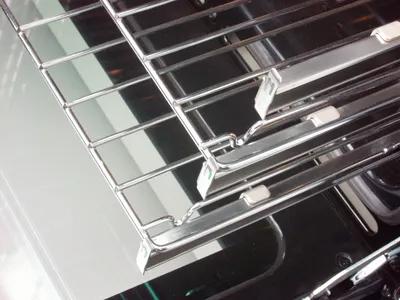 A close-up view of a telescopic oven rack.