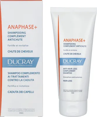 A product shot of a shampoo bottle and its box, presented side-by-side against a white background.
