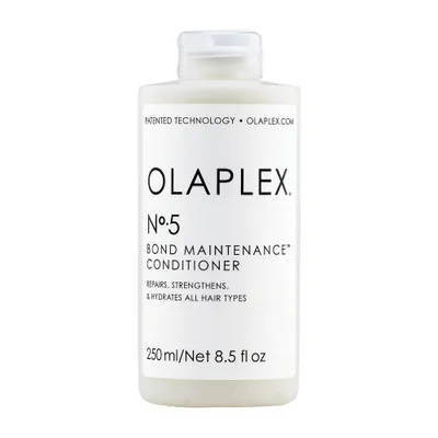 A white bottle of Olaplex No. 5 Bond Maintenance Conditioner against a white background.