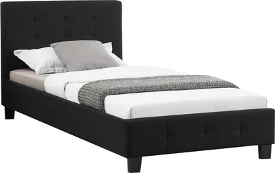A black upholstered bed frame with a headboard, shown with white and gray bedding.