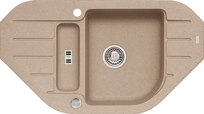 A top-down view of a beige granite kitchen sink.