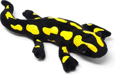 A plush toy salamander with black and yellow markings lies on a white background.
