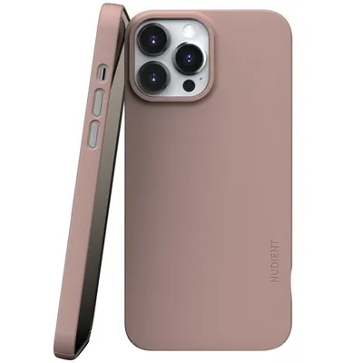 A dusty pink iPhone 13 Pro Max case is shown leaning against the back of the phone.