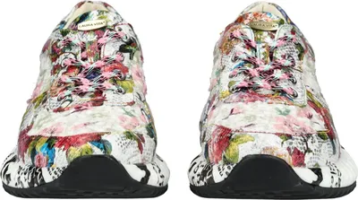 A pair of colorful floral print sneakers.