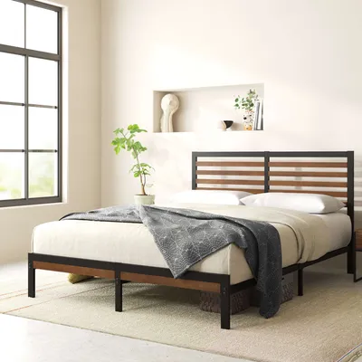 Modernes Bett aus Metall und Holz – zeitlos und stilvoll fürs Schlafzimmer.