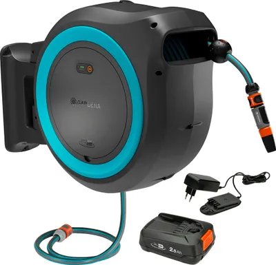 A wall-mounted automatic hose reel with a battery pack and charger.