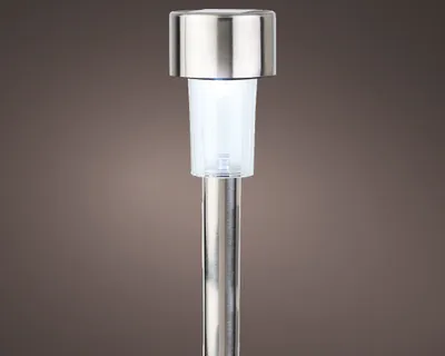 A close-up studio shot of a solar garden light.