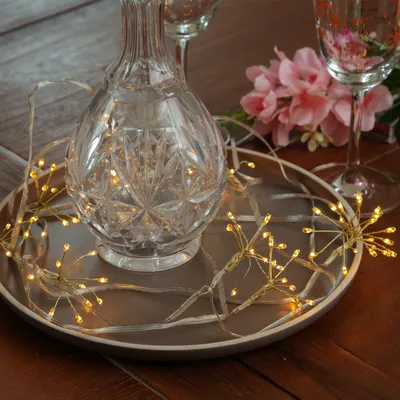LED Lichterkette Pusteblume - Feuerwerk Blume - 50 Tautropfen LED - 5 Blüten - L: 1m - Timer - gold