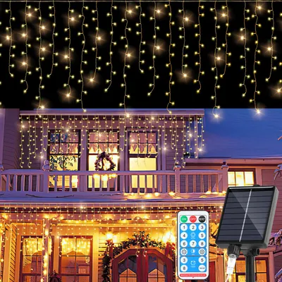 Immagine prodotto di Catena luminosa solare LED Ikodm da 10 metri, adatta per uso esterno, impermeabile, con effetto "pioggia di ghiaccio" (400 LED), decorazione per interni ed esterni, giardino, con telecomando, luce bianca calda