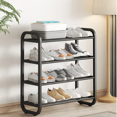 A multi-tiered shoe rack filled with various types of sneakers and high-top shoes.