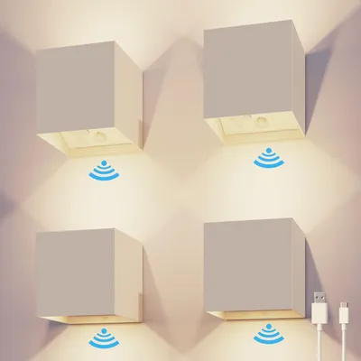 Produktbild von Calex Volterra Wandleuchte, für Außen & Innen, warmweißes Up & Down Licht, Akku aufladbar mit USB-C, kabellos, Bewegungsmelder, wasserdicht, Sand, 4er Pack
