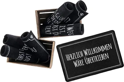 Produktbild von Pechkeks Fußmatte mit Spruch „Herzlich Willkommen. “ (Größe 70x50cm rutschfest, waschbar, schwarz), 70x50