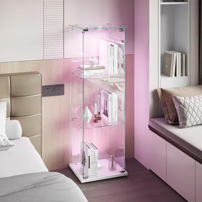 A glass display cabinet with LED lighting in a bedroom setting.