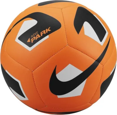 A close-up studio shot of an orange soccer ball with black and white accents.