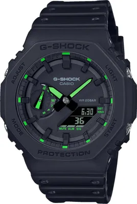 A close-up, front-facing studio shot of a black G-Shock watch with green accents.