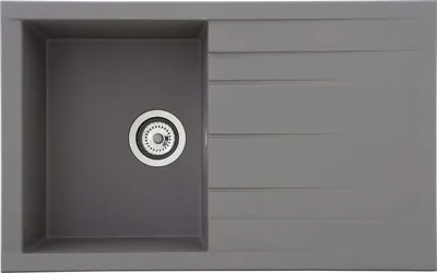 A top-down view of a gray kitchen sink with a drain.
