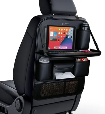 A black car seat organizer with multiple compartments, a tablet holder, and a tray, attached to the back of a car seat.